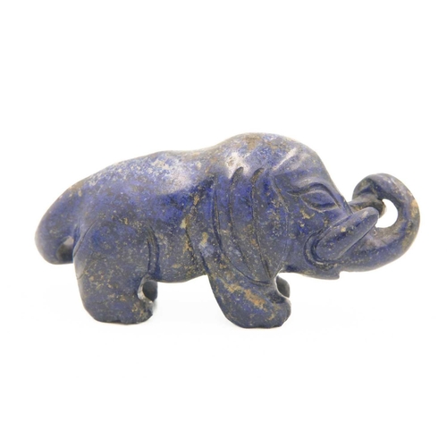 329 - A Chinese lapis lazuli model of an elephant on stand, Qing Dynasty, 19th century. Height of elephant... 