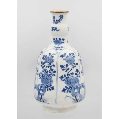 348 - A Chinese blue and white hookah base, Kangxi, 1662-1722. The bell-shaped body painted with stylised ... 