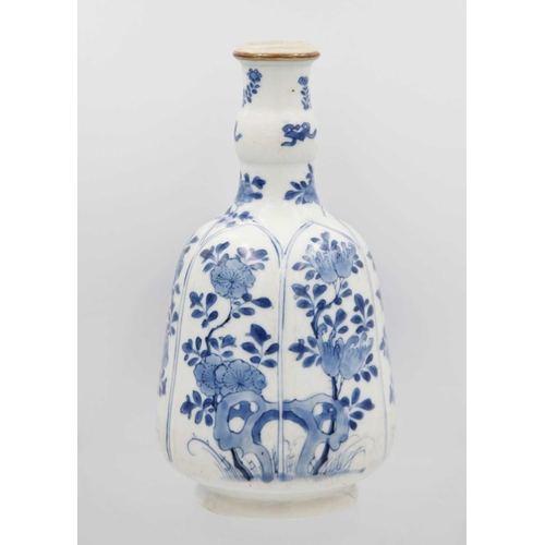 348 - A Chinese blue and white hookah base, Kangxi, 1662-1722. The bell-shaped body painted with stylised ... 