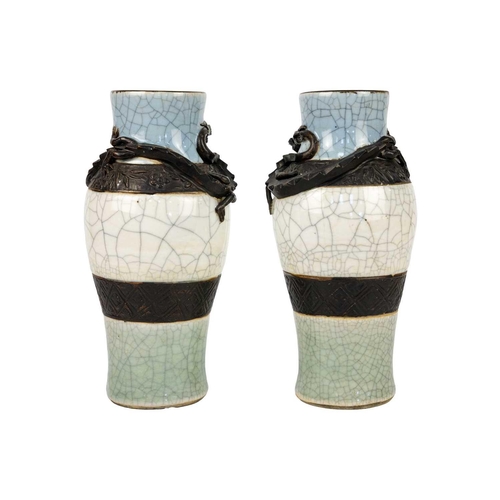 351 - A pair of Chinese crackle glaze vases, circa 1890. Each vase decorated in relief with a dragon, seal... 