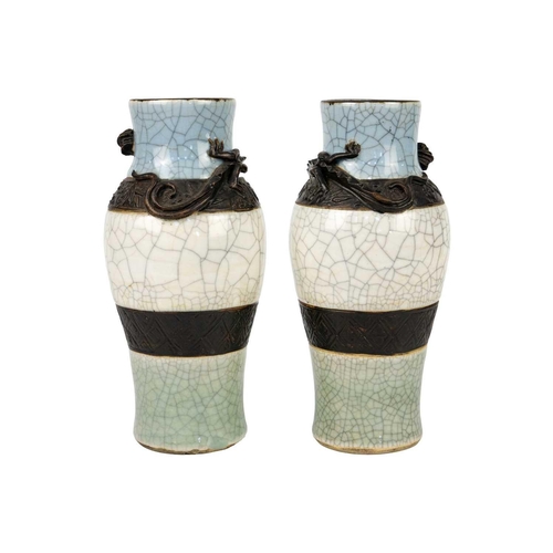 351 - A pair of Chinese crackle glaze vases, circa 1890. Each vase decorated in relief with a dragon, seal... 