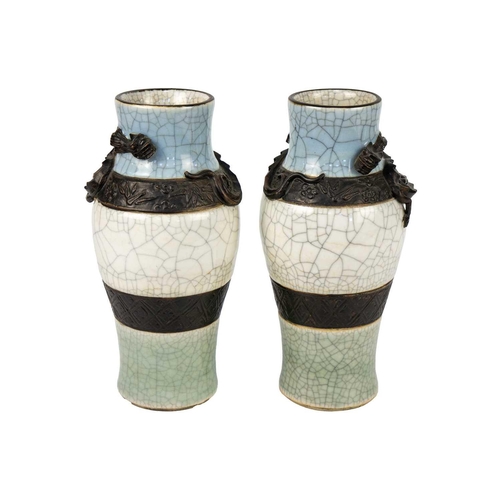 351 - A pair of Chinese crackle glaze vases, circa 1890. Each vase decorated in relief with a dragon, seal... 