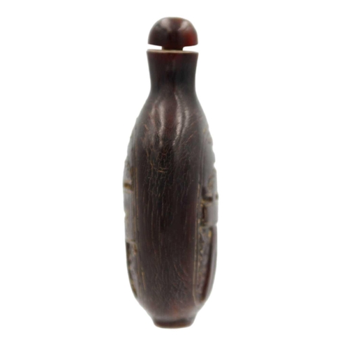 358 - A Chinese carved horn snuff bottle, Qing Dynasty, 18th/19th century. Height 8.5cm, width 5.5cm, dept... 