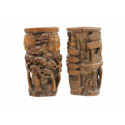 36 - A pair of Chinese carved bamboo brush pots, Qing Dynasty, 19th century. Carved with figures, pagodas... 