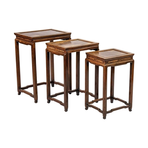 360 - A Chinese hardwood quartetto of tables, early 20th century. With burl wood rectangular tops on legs ... 