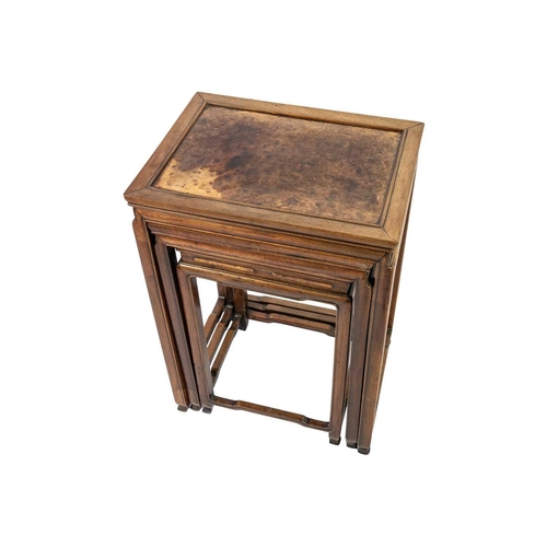 360 - A Chinese hardwood quartetto of tables, early 20th century. With burl wood rectangular tops on legs ... 