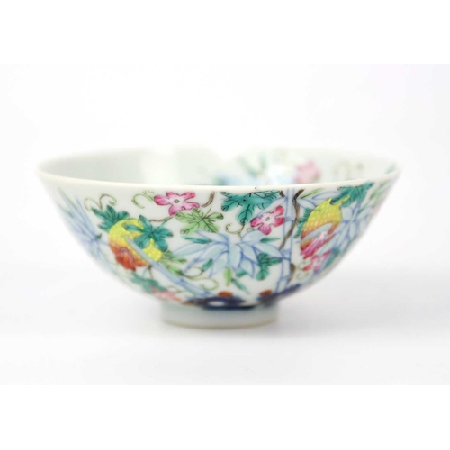 37 - A Chinese famille rose porcelain bowl, 19th century. Floral and bamboo decorated, Qianlong mark to b... 