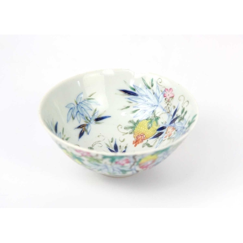 37 - A Chinese famille rose porcelain bowl, 19th century. Floral and bamboo decorated, Qianlong mark to b... 