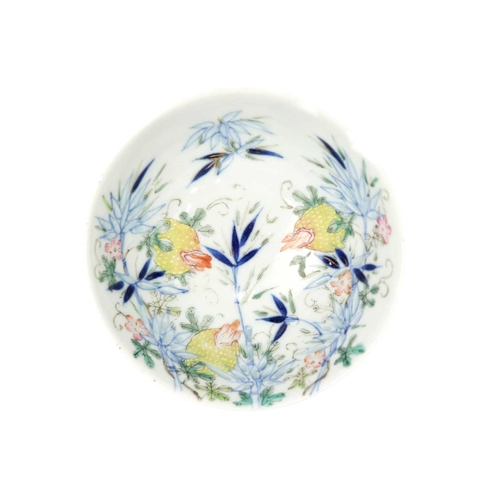 37 - A Chinese famille rose porcelain bowl, 19th century. Floral and bamboo decorated, Qianlong mark to b... 