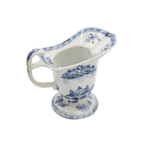 371 - A Chinese export blue and white porcelain jug, 18th century. Of hemet form and decorated with a fema... 