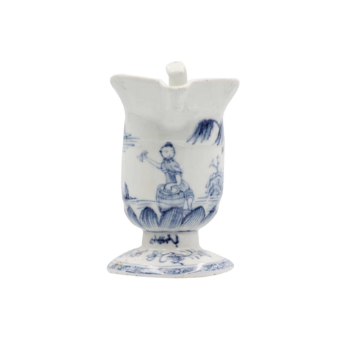 371 - A Chinese export blue and white porcelain jug, 18th century. Of hemet form and decorated with a fema... 