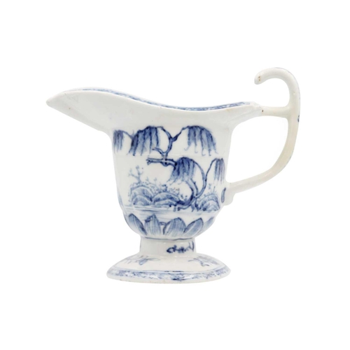 371 - A Chinese export blue and white porcelain jug, 18th century. Of hemet form and decorated with a fema... 