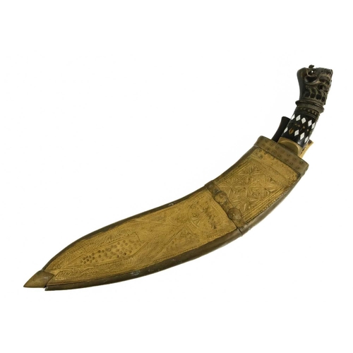 379 - A Nepalise Kukri, early 20th century. With carved wood grotesque mask handle and acanthus leaf engra... 