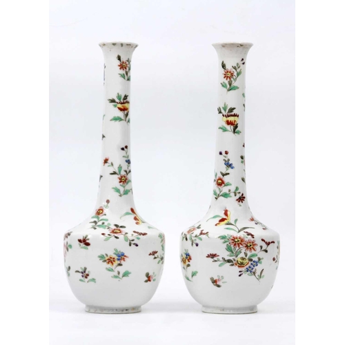 380 - A pair of Japanese porcelain vases, Meiji period. Decorated with polychrome painted floral sprays, h... 