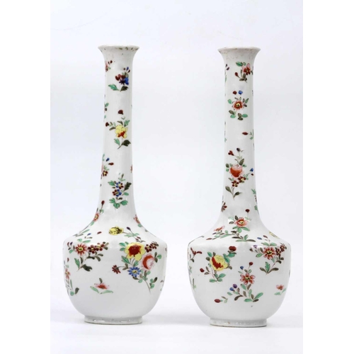 380 - A pair of Japanese porcelain vases, Meiji period. Decorated with polychrome painted floral sprays, h... 