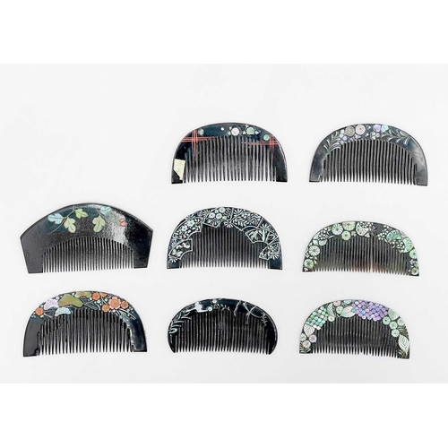 397 - Eight Japanese black lacquer combs, 20th century. Including enamel and mother-of-pearl floral decora... 