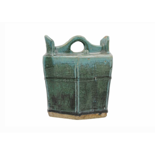 43 - A Chinese Shiwan pottery green-glazed teapot, 19th century. Height 20cm, width 19.5cm, depth 19.5cm.