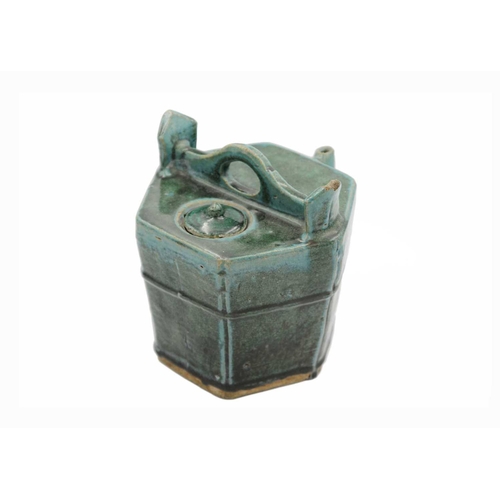 43 - A Chinese Shiwan pottery green-glazed teapot, 19th century. Height 20cm, width 19.5cm, depth 19.5cm.