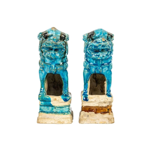 44 - Two Chinese turquoise pottery dogs of fo joss stick holders, Ming Dynasty. Height 17cm, width 5.5cm,... 