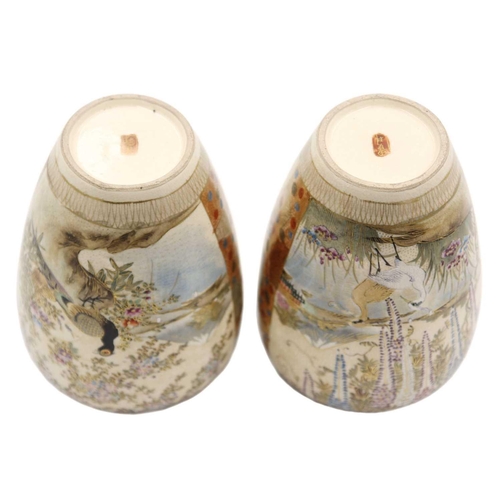 445 - A pair of Japanese Satsuma vases, Meiji period. Each signed to base, height 16.5cm, width 11cm. (2)