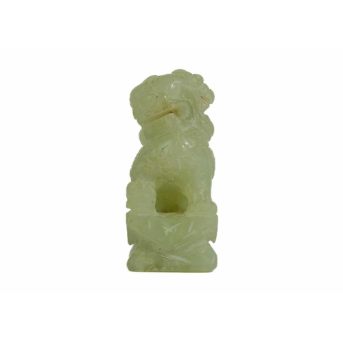 452 - A Chinese carved jade model of a dog. Height 5.5cm; width 4cm, depth 2.5cm and two Chinese models of... 