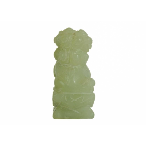 452 - A Chinese carved jade model of a dog. Height 5.5cm; width 4cm, depth 2.5cm and two Chinese models of... 