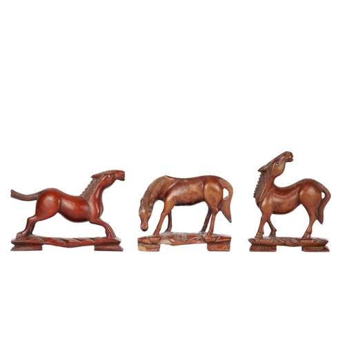 454 - Five Chinese carved wood models of horses, early 20th century. Largest height 12cm, largest length 1... 