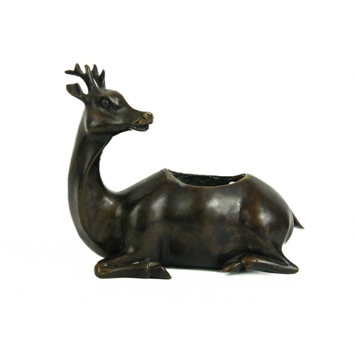 468 - A Chinese bronze incense burner, late 19th century. Depicting Shou Lao seated on a deer, height 20cm... 