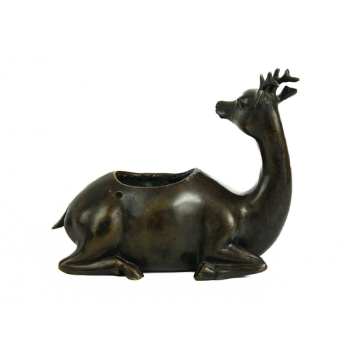 468 - A Chinese bronze incense burner, late 19th century. Depicting Shou Lao seated on a deer, height 20cm... 