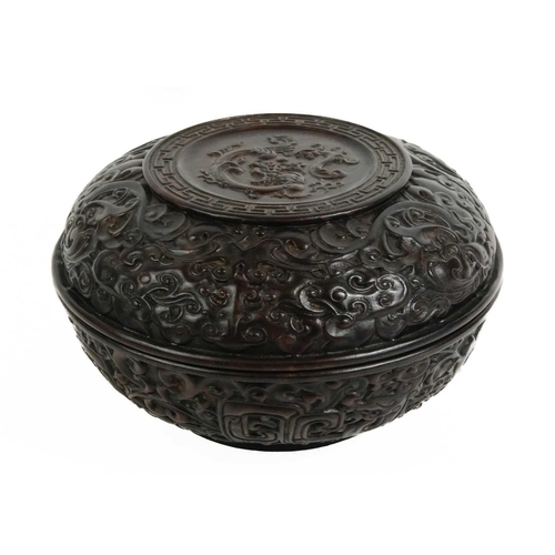 472 - A Chinese hardwood sweetmeat box and cover, circa 1900. Carved with foliage and cloud scrolls, heigh... 