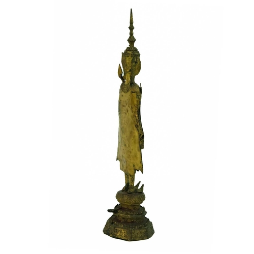 54 - A Thai gilt bronze standing Buddha in royal attire, 18th/19th century. With left hand raised and sta... 