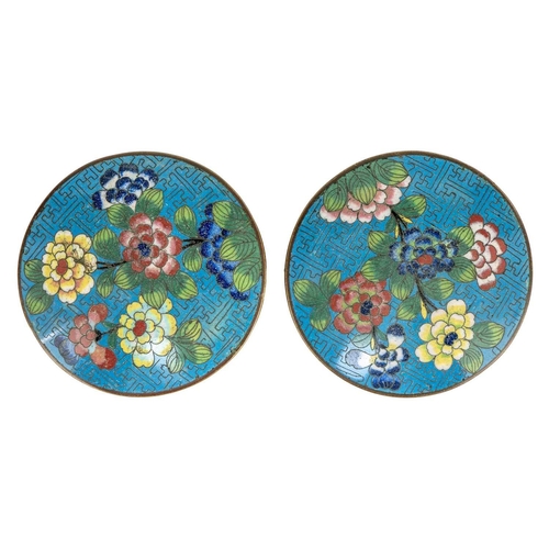 58 - A pair of Chinese cloisonne cylindrical jars and covers, early 19th century. Each with a pale blue g... 