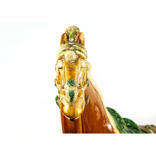 608 - A large Chinese Tang style sancai model of a horse. Height 58cm, length 54cm, depth 22cm.