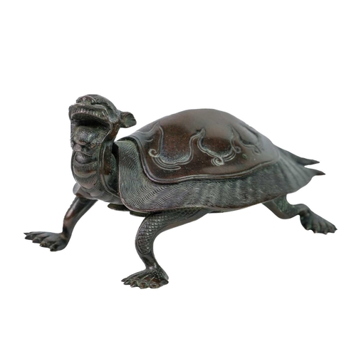 61 - A Chinese bronze model of a turtle, 19th century. Of Longevity and Tenacity, upturned stylized head,... 