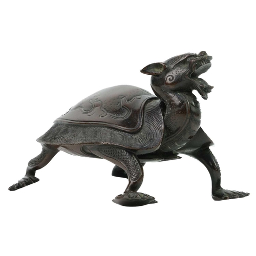 61 - A Chinese bronze model of a turtle, 19th century. Of Longevity and Tenacity, upturned stylized head,... 