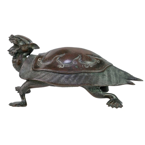 61 - A Chinese bronze model of a turtle, 19th century. Of Longevity and Tenacity, upturned stylized head,... 