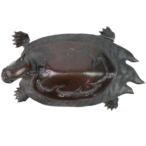 61 - A Chinese bronze model of a turtle, 19th century. Of Longevity and Tenacity, upturned stylized head,... 