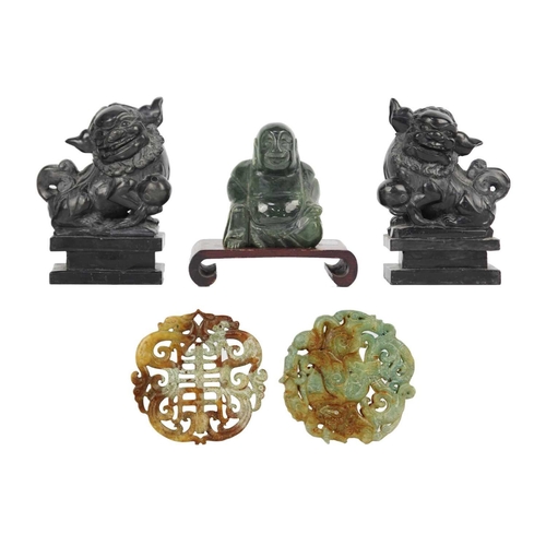 610 - A Chinese jadeite model of Buddha. Height 8cm, on a wooden stand; two bi discs, diameter 6.5cm; and ... 