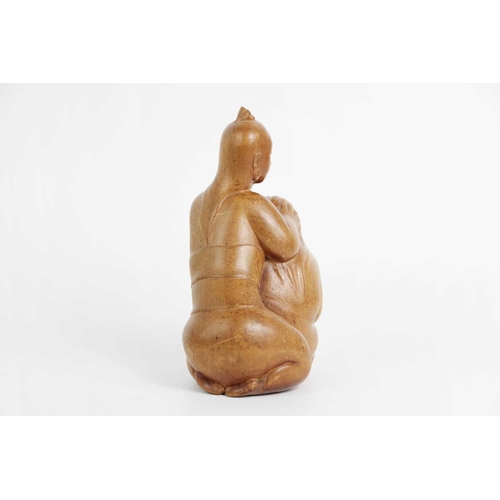 611 - Ida Bagus Tilem. Indonesian, 1936-1993, carved wood figure. Inscribed on base 'IDA BAGUS TILEM MAS B... 