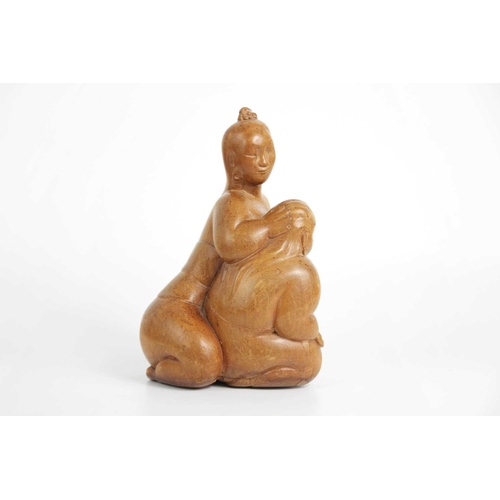 611 - Ida Bagus Tilem. Indonesian, 1936-1993, carved wood figure. Inscribed on base 'IDA BAGUS TILEM MAS B... 