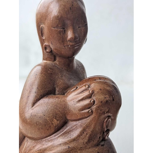 611 - Ida Bagus Tilem. Indonesian, 1936-1993, carved wood figure. Inscribed on base 'IDA BAGUS TILEM MAS B... 