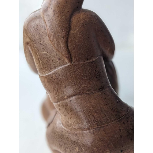 611 - Ida Bagus Tilem. Indonesian, 1936-1993, carved wood figure. Inscribed on base 'IDA BAGUS TILEM MAS B... 