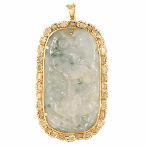 615 - A carved jade and 9ct mounted pendant. 9 x 4.8cm, 54 grams.