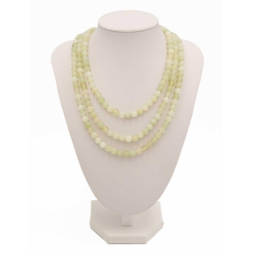 616 - A green hardstone necklace, with 9ct gold clasp. Length 67.5cm, 96 grams.