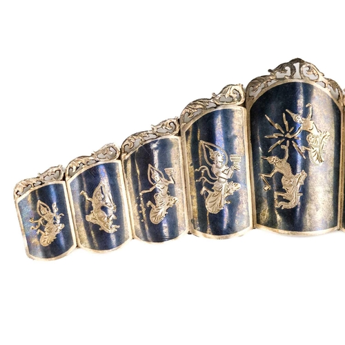 618 - A Siamese sterling silver niello bracelet, 20th century. Stamped on reverse 'STERLING, MADE IN SIAM'... 