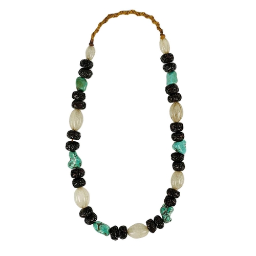 619 - A Tibetan necklace. Length 35cm; a cultured pearl necklace, length 33.5cm; and an African necklace, ... 