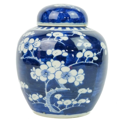 624 - A Chinese blue & white prunus blossom pattern ginger jar & cover, circa 1900. Height 16cm, width 12c... 