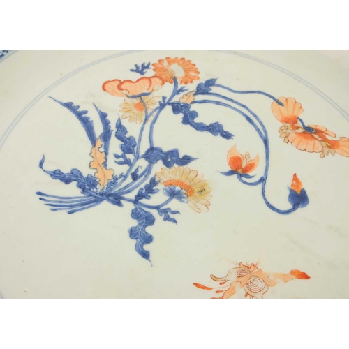 64 - A Chinese Imari porcelain shallow dish, 18th century. With floral spray to the centre, the blue and ... 