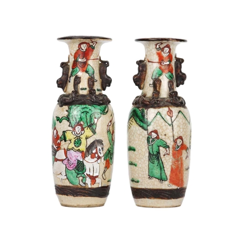 665 - A pair of Chinese crackle glazed vases, 19th century. Height 20cm, width 7cm. (2)