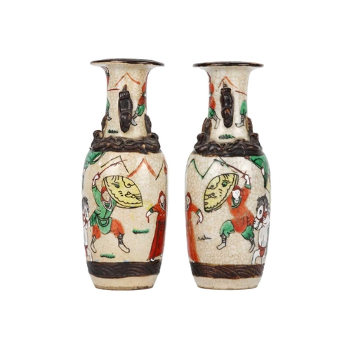 665 - A pair of Chinese crackle glazed vases, 19th century. Height 20cm, width 7cm. (2)